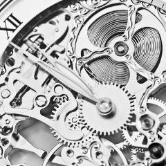black and white close view of watch mechanism black and white close view of watch mechanism